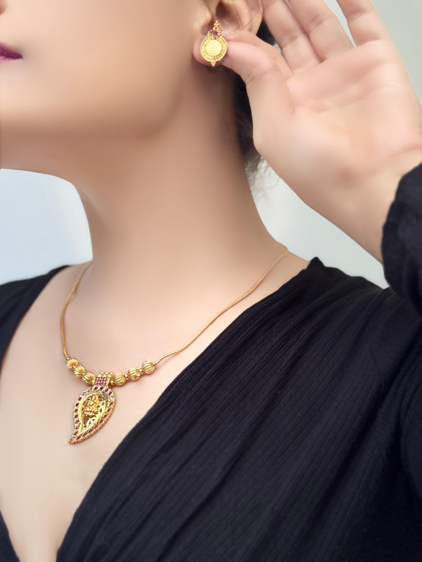 Annapurna 22 CT Gold-Plated Maanga Mala with Laxmi Motifs and Matching Earrings