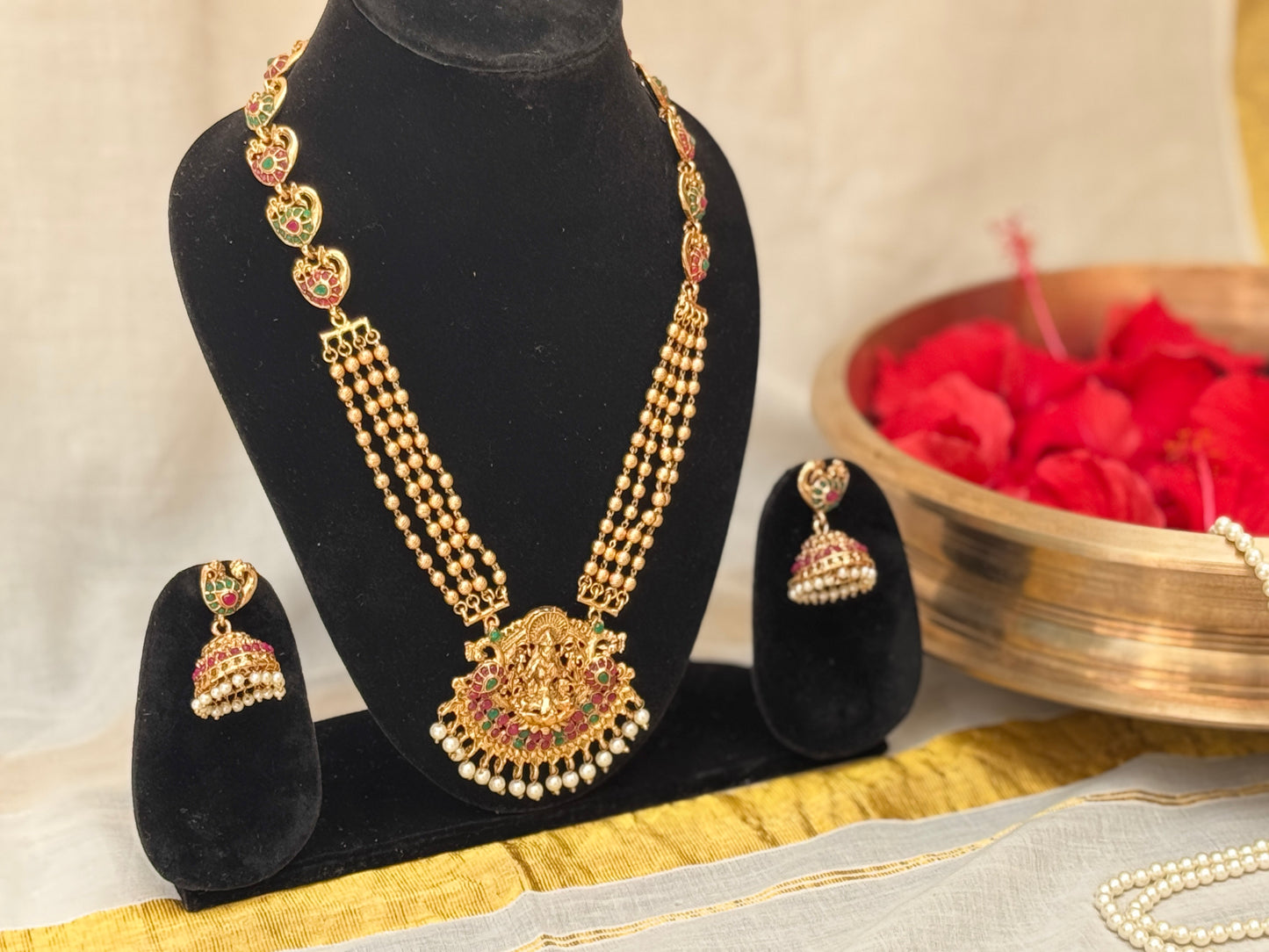 Janaki Long Haram Necklace with Mayura motif Jhumkis