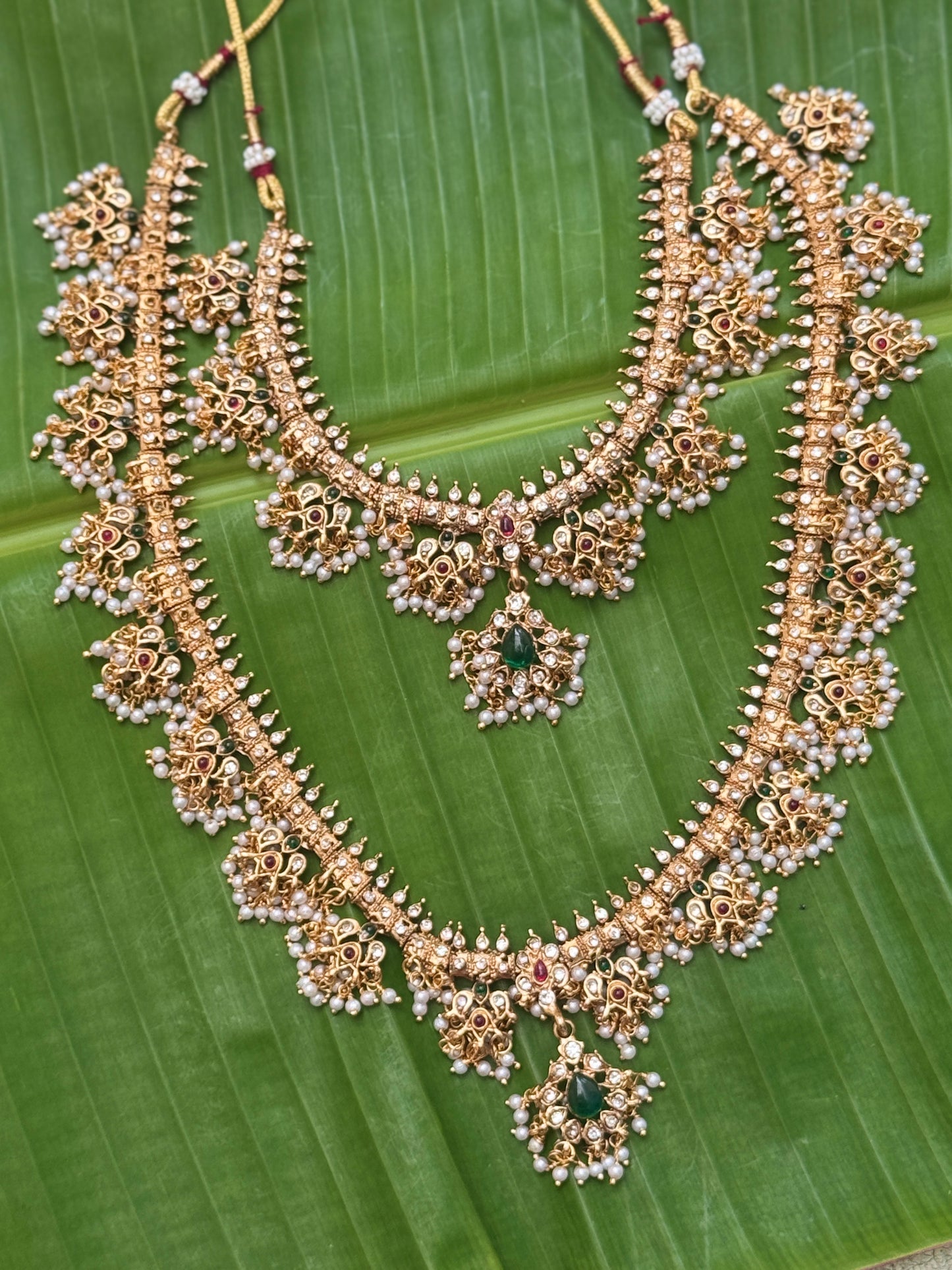 Radhika Pearl Guttapusalu double Haram Necklace set with Drop Earrings
