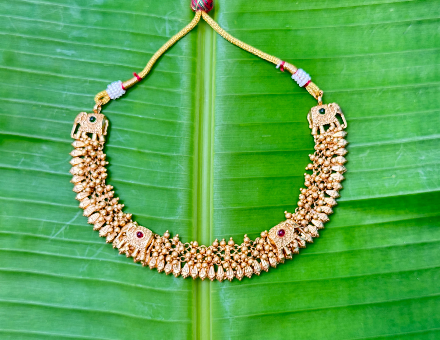 Gold Gajagamini Guttapusalu Necklace set with Jhumkis