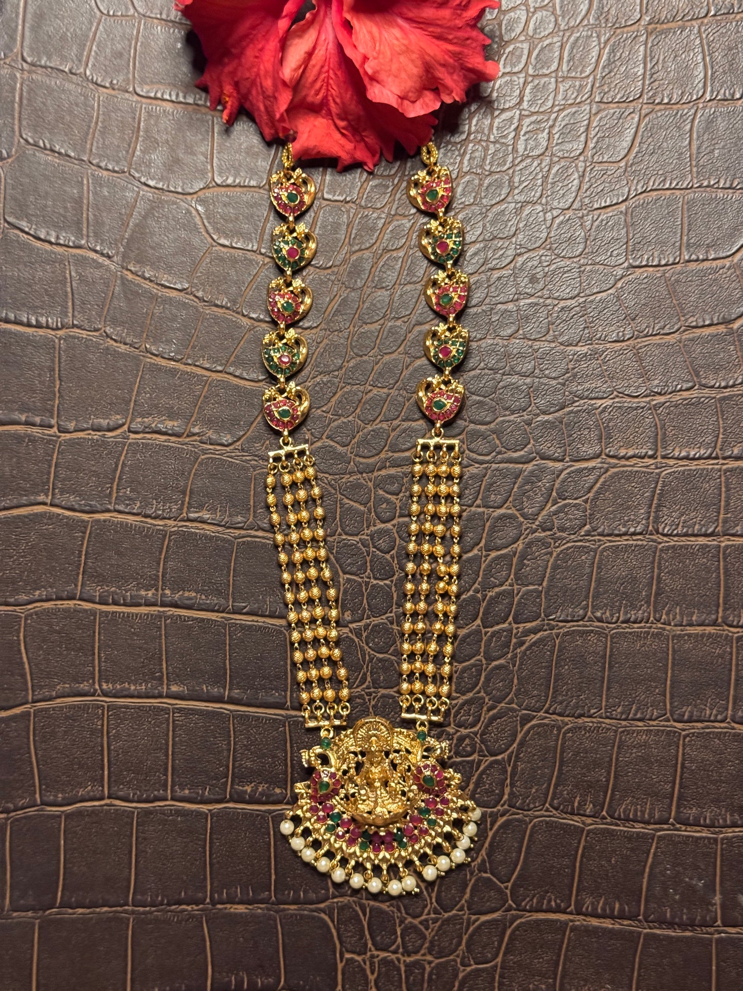 Janaki Long Haram Necklace with Mayura motif Jhumkis