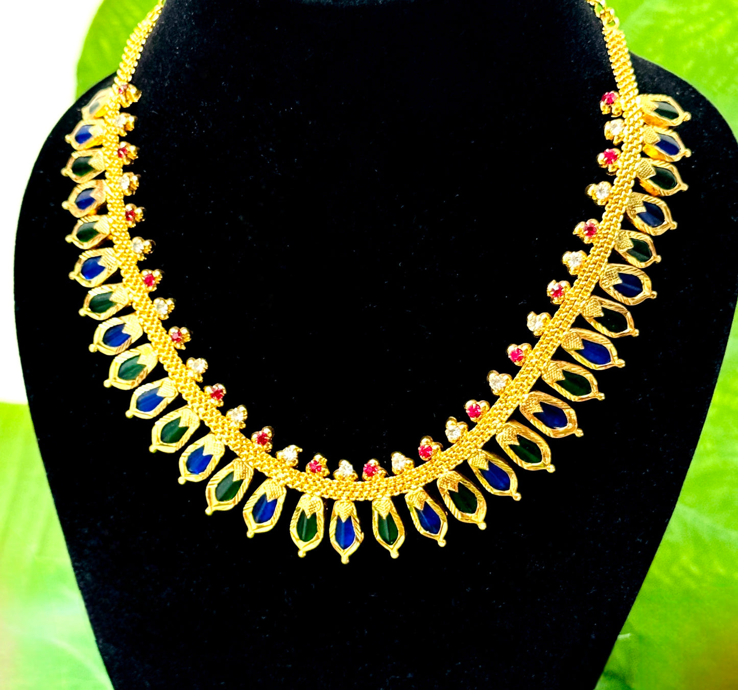 Beautifully Crafted Ananta Nagapadam 22 CT Gold-Plated Green and Blue Palakka