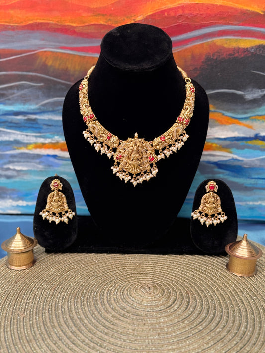Intricate Aishwarya Haram Necklace set with Pearl and Coral detailing